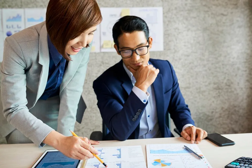 entrepreneurs-discussing-financial-documents-large